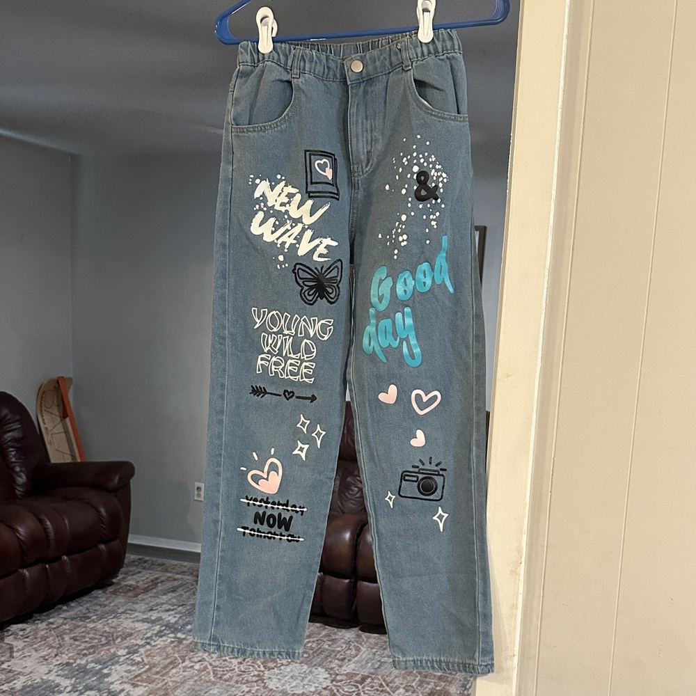 Girls size 12 Graphic Blue Jeans with Vinyl Patches